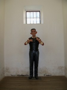 Model of a prisoner ¨with evil ears¨in his cell